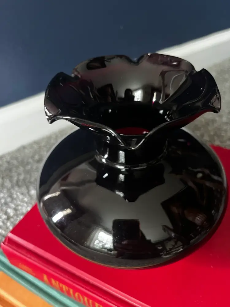 Vintage black amethyst glass vase with a ruffled rim