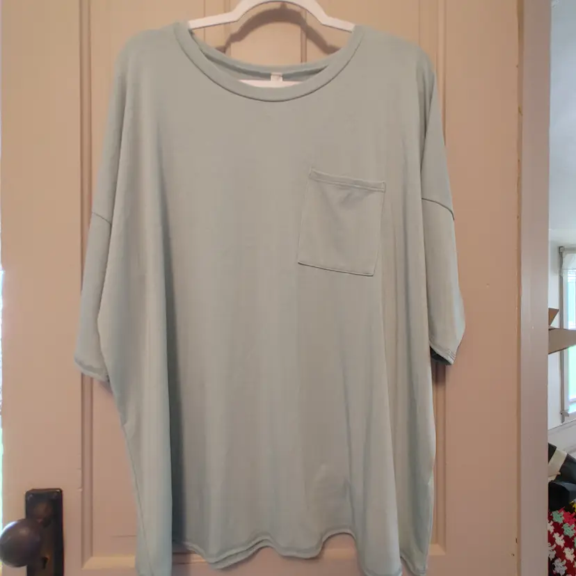 Top- Brand: Vanilla Bay. Size Large. Sage green top. Oversized. NWT. Retail $37. Material- 33% rayon, 62% polyester, 5% spandex. No callouts.
