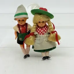 Vintage Collectible Celluloid Miniature Dolls Sleep Eyes Jointed Arms & Legs From Germany Traditional Bavarian Or Tyrolean Outfits Lederhosen For Boy Felt Hats W/Feathers For Both Christmas Tree Ornaments Or Travel Souvenirs