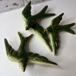 glazed hunter green ceramic swallows, a traditional Portuguese wall decor READ