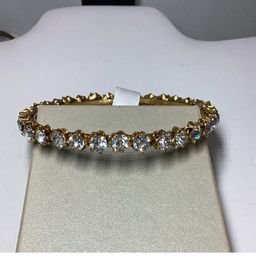 Crystal Gold tone Bangle Bracelet 8”’
Signed Juanita