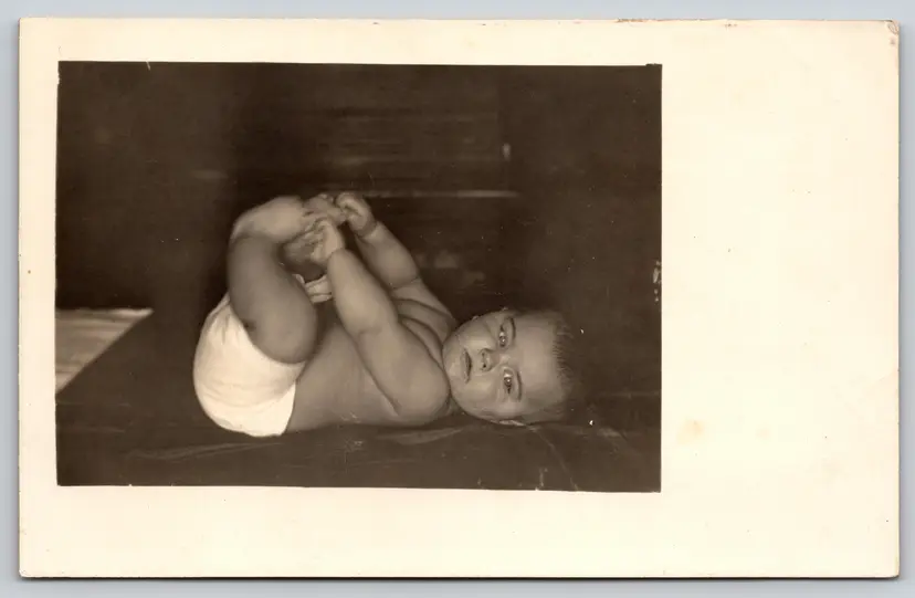 Postcard RPPC Chubby Baby Holding Toes Child Real Photo - 9027