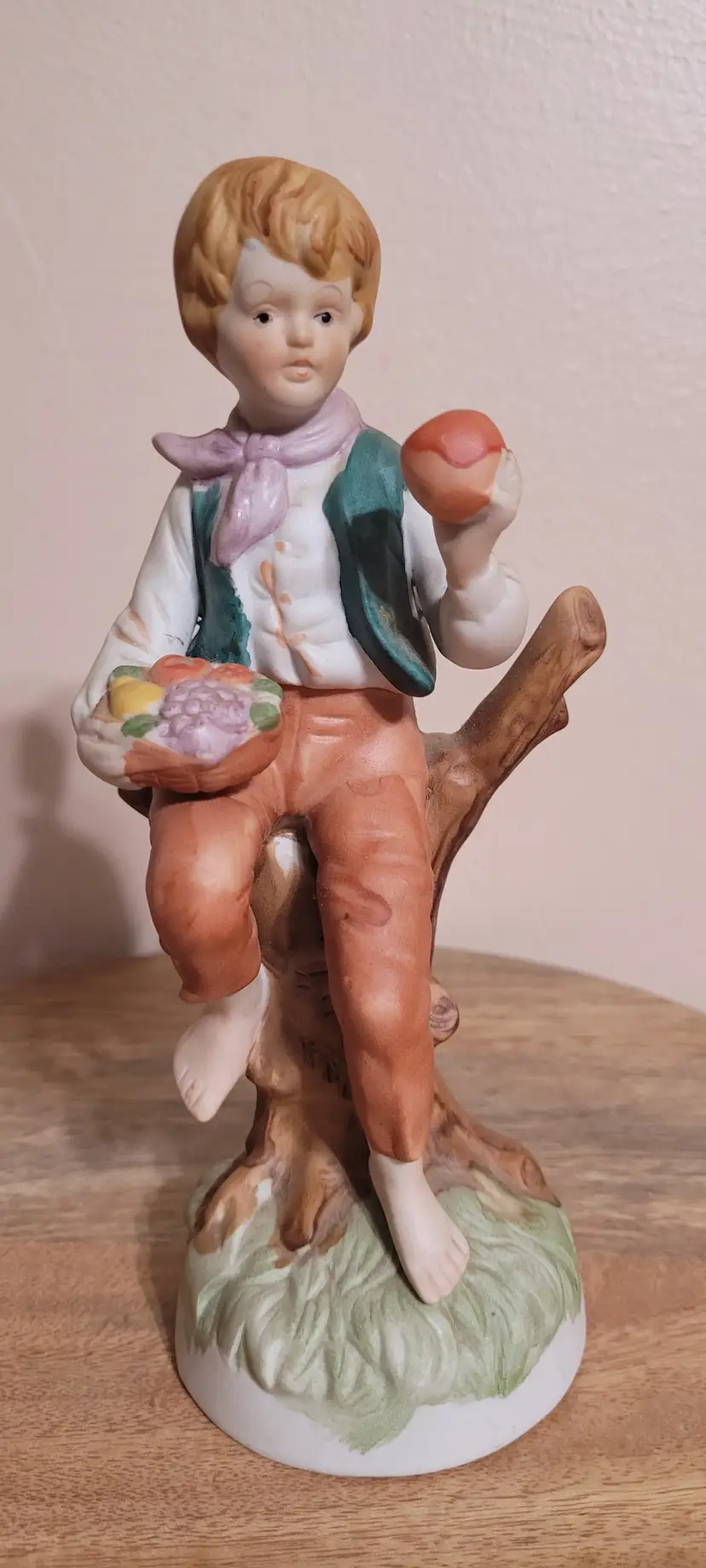 Giftcraft Porcelain Boy Holding Fruit
