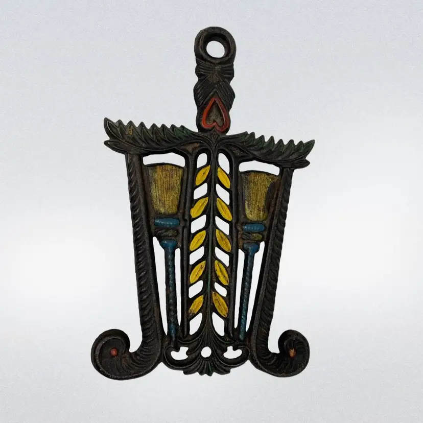 VTG Cast Iron Trivet Painted Brooms And Heart