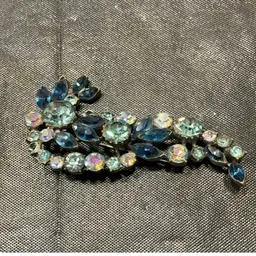 Blue And AB RS Brooch. Measures 3”x1.25”