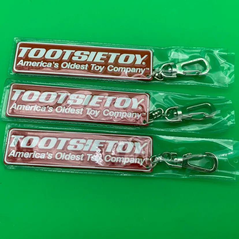 TootsieToy America's Oldest Toy Company Red Metal Keychain Trio - New Old Stock