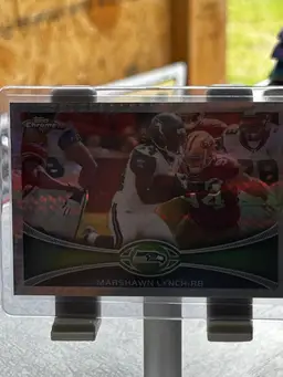 2012 Topps Chrome Marshawn Lynch X-Fractor #132 Refractor Seahawks 55/216