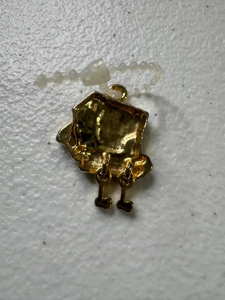 # 37 Gold Tone & Glass Rhinestone, Spongebob Squarepants Articulated Pendant 1”￼
