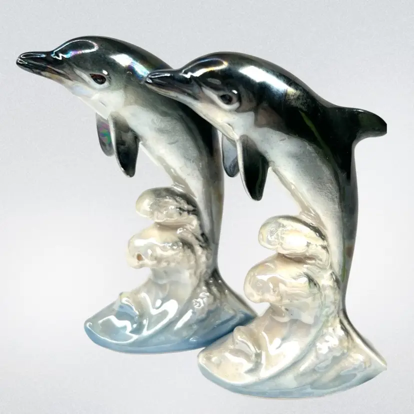 Vintage Pair 3.5” Dolphins 🐬🐬 Leaping The Ocean Waves 🌊 . Beautiful Iridescence. One Sticker On Bottom “Made In Japan”.
