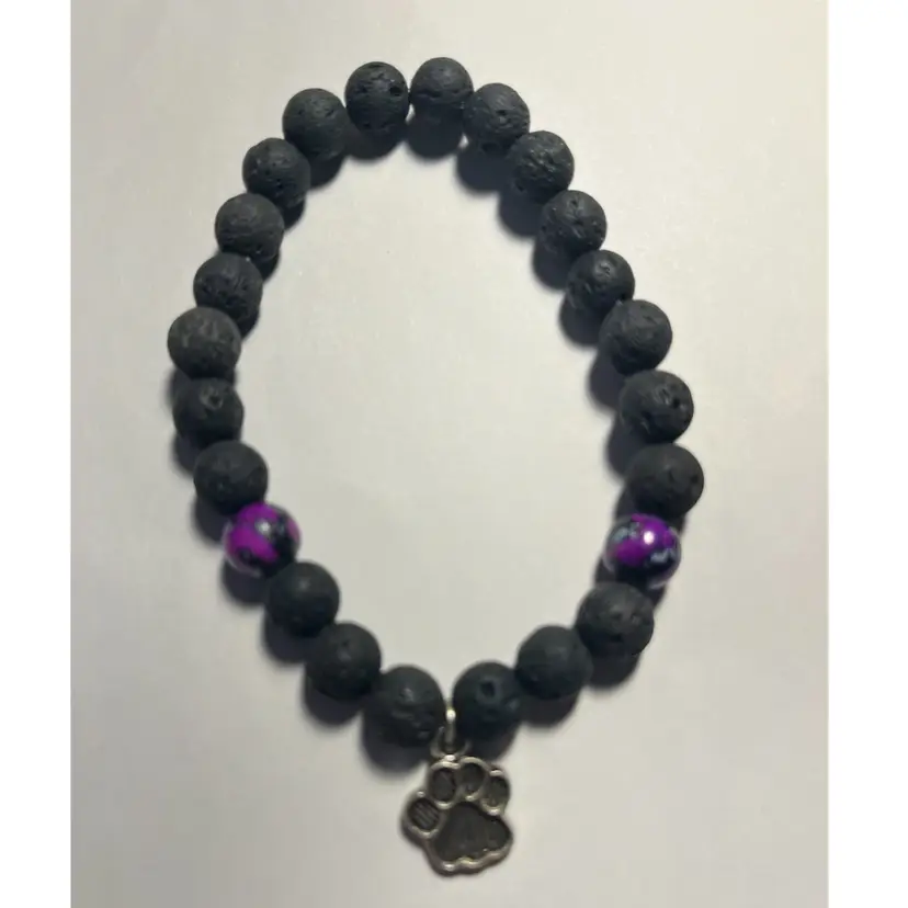Stretchy Bracelet With paw print Charm lava beads and purple/black beads