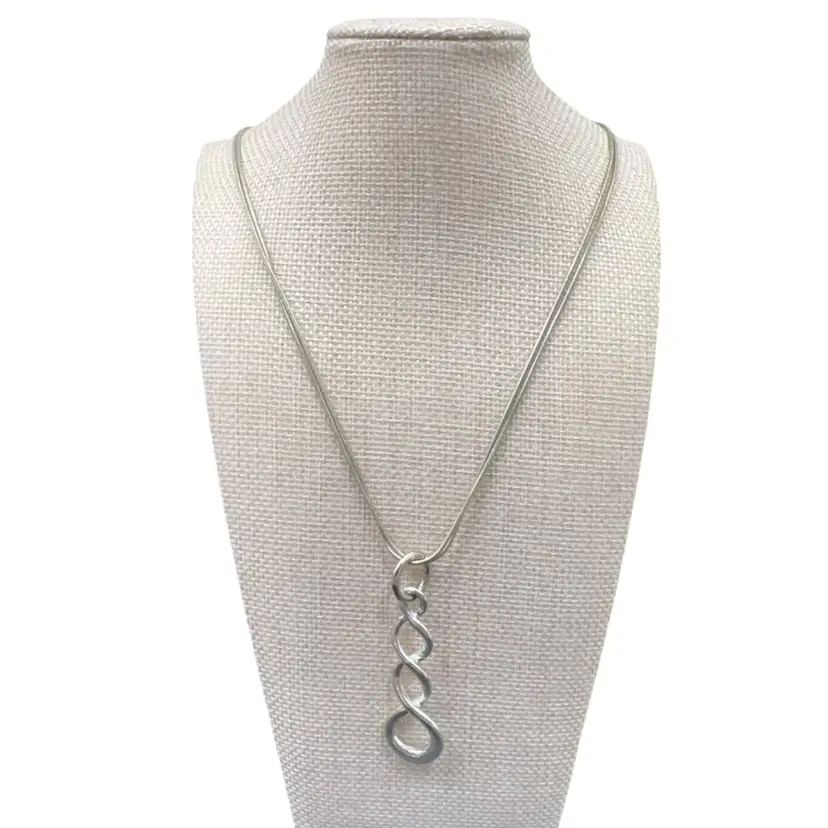 Silver Tone Twisted Pendant And Necklace