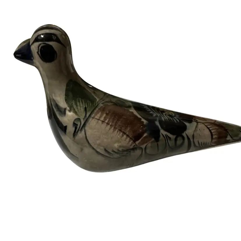 A vintage, hand-painted Tonalá pottery dove figurine