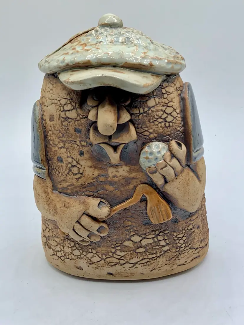 Vtg Whimsical pottery golfer piggy bank. Artist signed 6” figural Cork Stopper