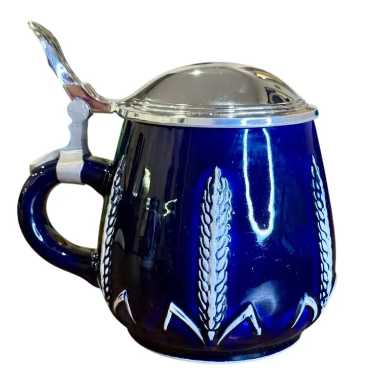 Vintage traditional German beer stein, also known as a Bierkrug.