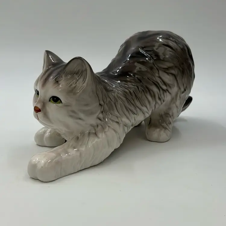 Playful Cat With Green Eyes