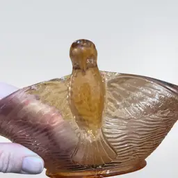 Fenton pink glass 'Bird's Nest' bowl with flying bird handles. 1940s 7.5 “ Wide