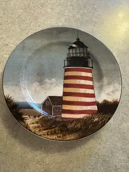 Decorative ceramic plate titled 'By The Sea' from David Carter Brown
Collection by Oneida