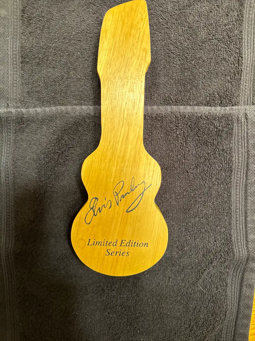 Vintage Elvis Presley wooden guitar case with Elvis face Watch