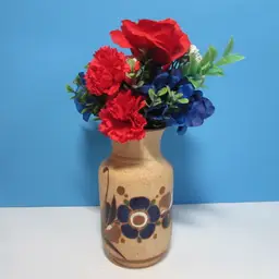 vintage Mexico pottery floral vase 6 1/2" tall with patriotic floral arrangement