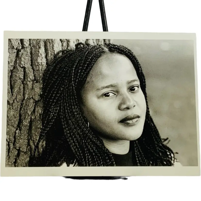 Vintage Postcard Black Writers
PHOTOGRAPHS BY JILL KREMENTZ
EDWIDGE DANTICAT, Brooklyn, N.Y., July 11, 1995
Edwidge Danticat (b. 1969) began publishing her stories at age four-teen, soon after arriving in the United States from Haiti. Her debut novel, Breath, Eyes, Memory (1994), quickly established her presence, and Krik? Krak! (1995) confirmed her promise, earning a nomination for the National Book Award.
POMEGRANATE