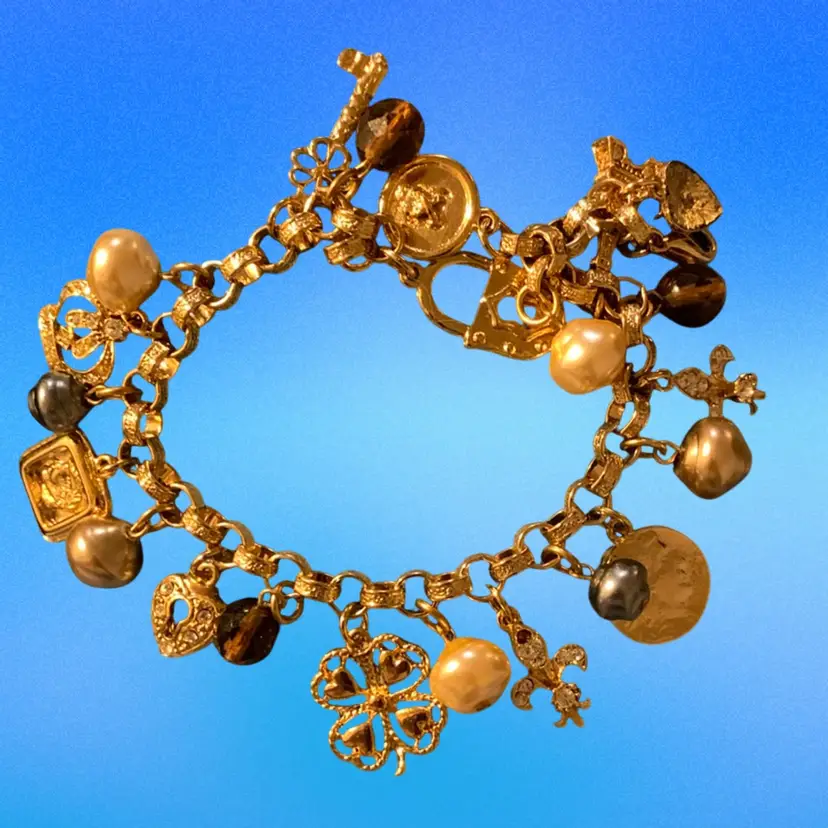 #01 Gold Tone Charm Bracelet With Rhinestone Charms, Faux Pearls And Gold Tone Charms Symbols Of France