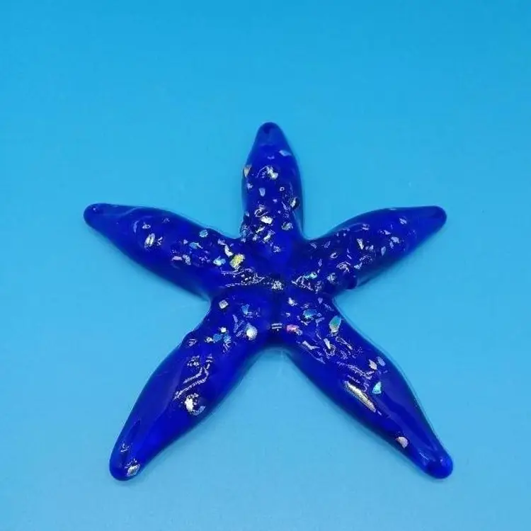 Hand blown cobalt glass starfish with colored pieces 5 in