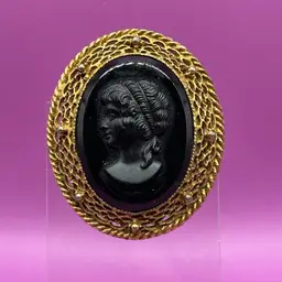 Vintage Black Cameo Style Gold Tone Brooch Left Facing