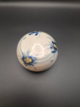 Pottery paperweight signed