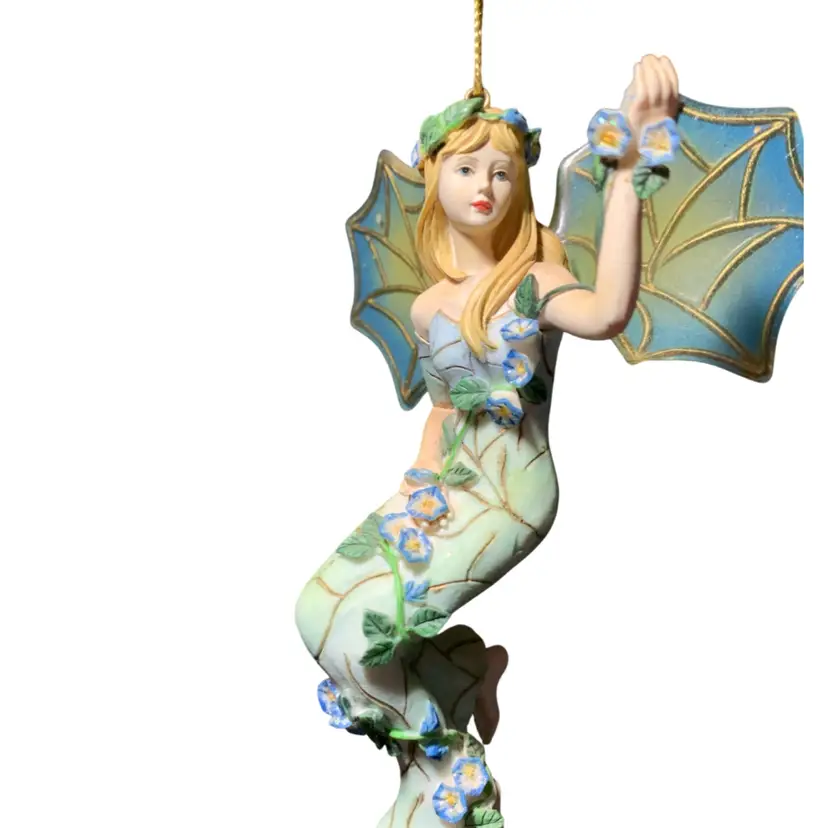 Fairies & Other Magical Creatures Train Item 4 Vintage Ashton-Drake Galleries "On Wings of Light" ornament features a fairy with leaf-like wings and floral details.