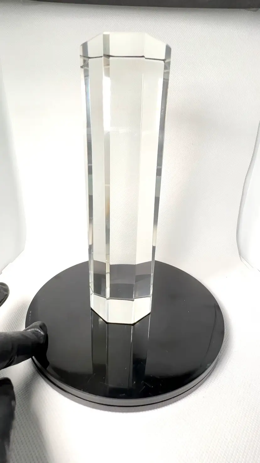 Octagonal Pillar Prism Tall Crystal Glass Paperweight. Unmarked. Size: 
7-5/16” H x 2” diameter.