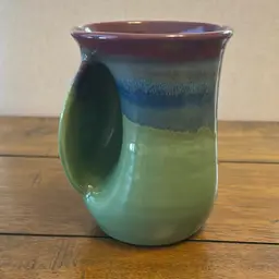 Clay In Motion Hand Warmer Mug
