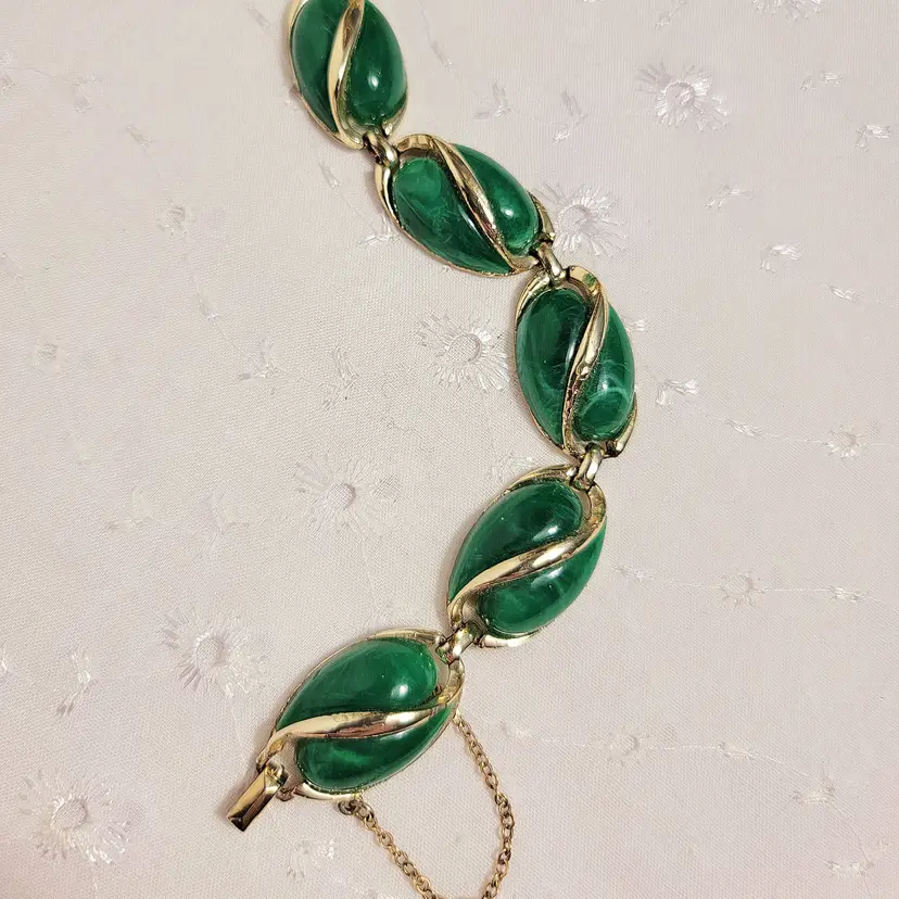 Pat. PEND faux green malachite and goldtone bracelet with safety chain