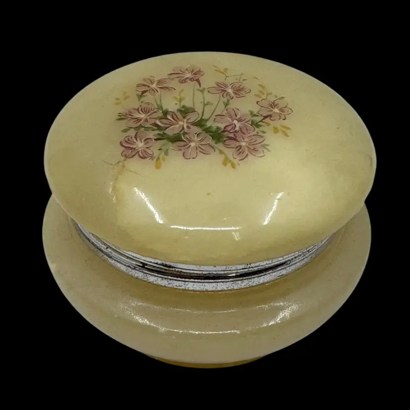 Vintage hand-painted alabaster trinket box with floral decoration.