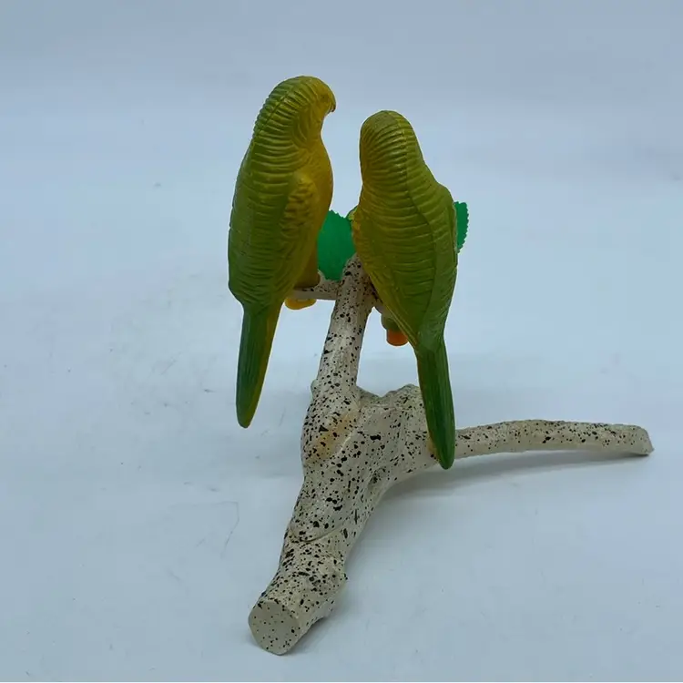 Vintage plastic budgie salt and pepper shakers on a branch Yellow And Green.