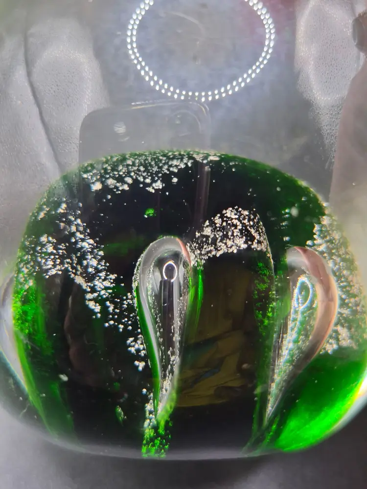 Handmade Glass Paperweight With Swirling Green & Silver Accents