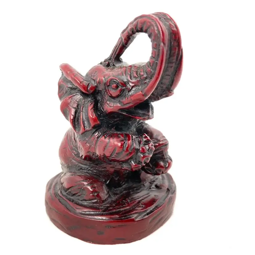 Sitting Chinese Elephant with Raised Trunk Dark Red Resin Figurine Vintage