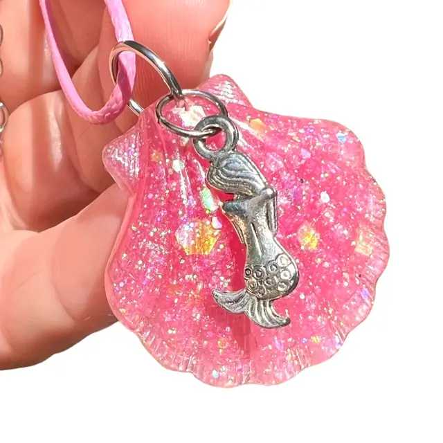 Pretty Pink Resin Shell Necklace with Silver-tone Metal Mermaid Charm. Handmade by me 🫶. Seashell 1-1/4” wide x 1-1/4