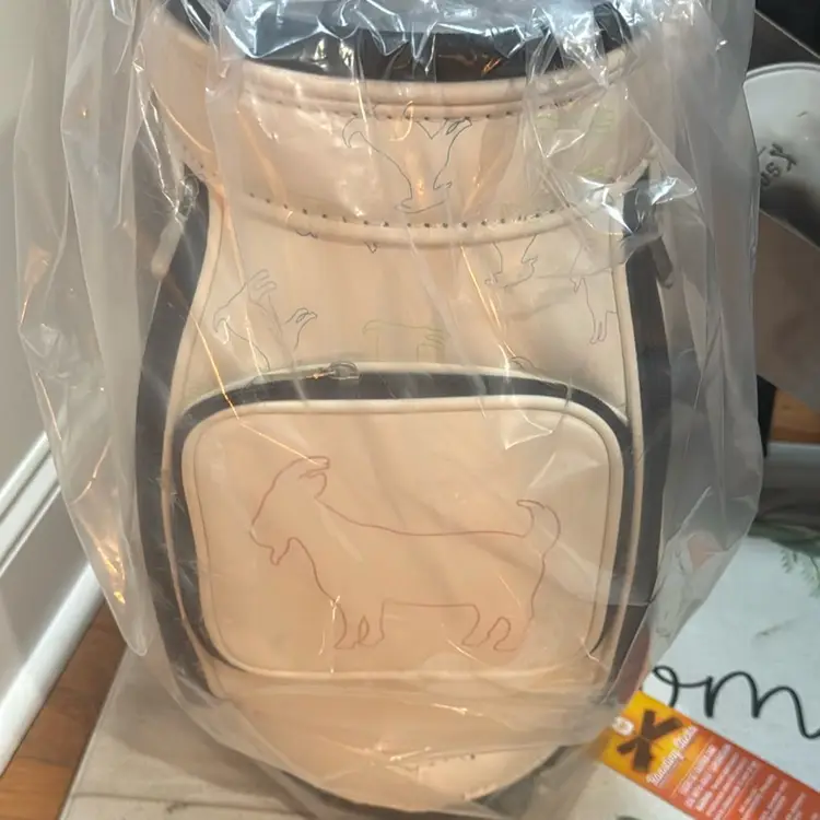 Goated Din Caddy White