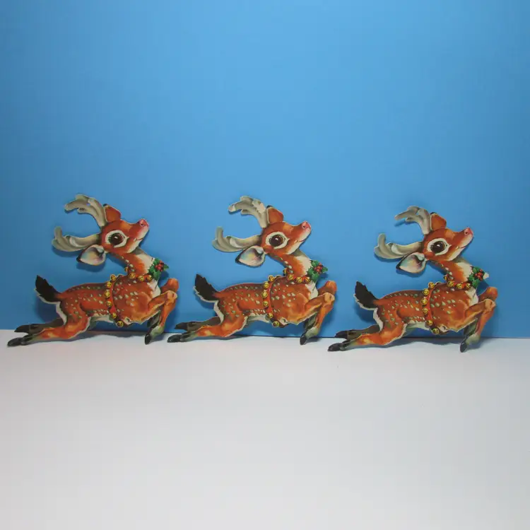 set of 3 vintage Santa's flying reindeer cardboard cut outs 6 1/2"