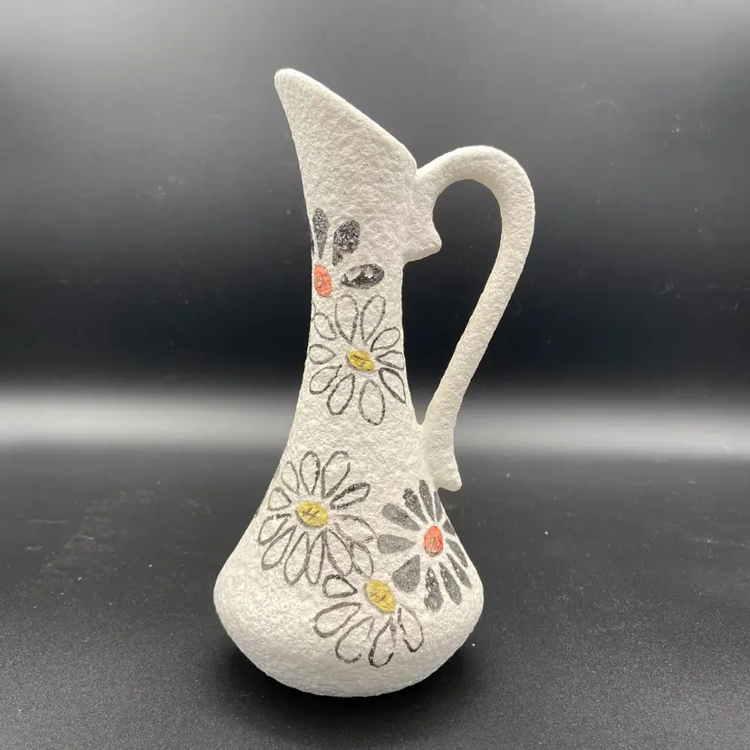 Vintage textured white vase with black outline flowers orange and yellow centers