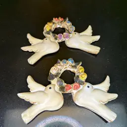 Pair Of Pottery Doves With Flower Wreaths