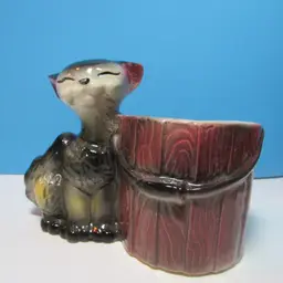 vintage smiling grey black kitty cat sitting by bucket ceramic planter holder