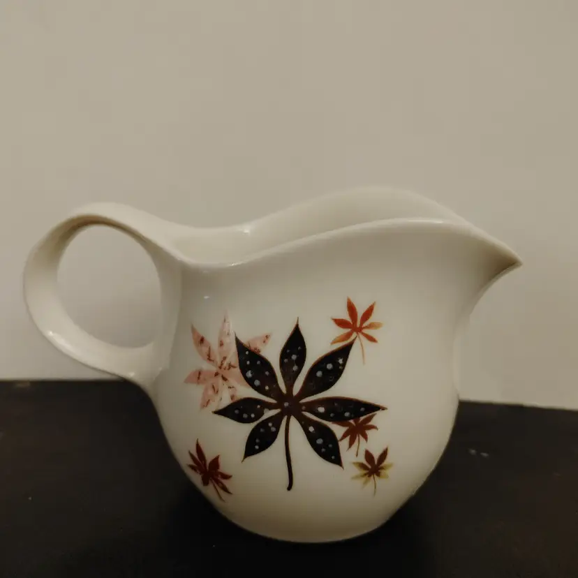 Shenango China by Peter Terris. Calico Leaves pattern. Vintage creamer. Mid 50's. No chips or cracks.