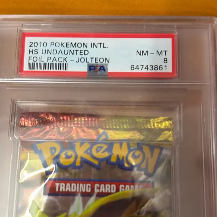 PSA 8 HS Undaunted Jolteon Foil Booster Pack