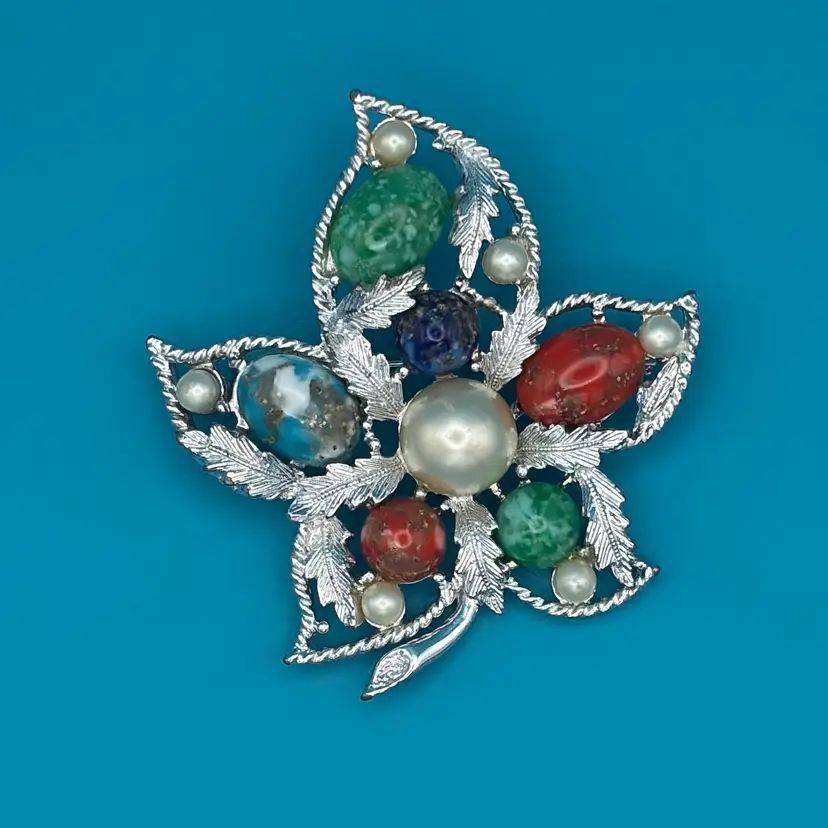 Vintage Sarah Coventry “Celestial Fire” Brooch – Silver-Tone Leaf with Multi-Color Cabochons – 1960s.