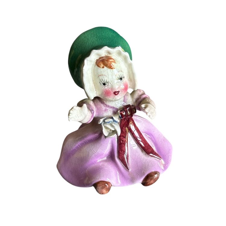 Girl with Pink Dress and Green Bonnet Ceramic Figurine