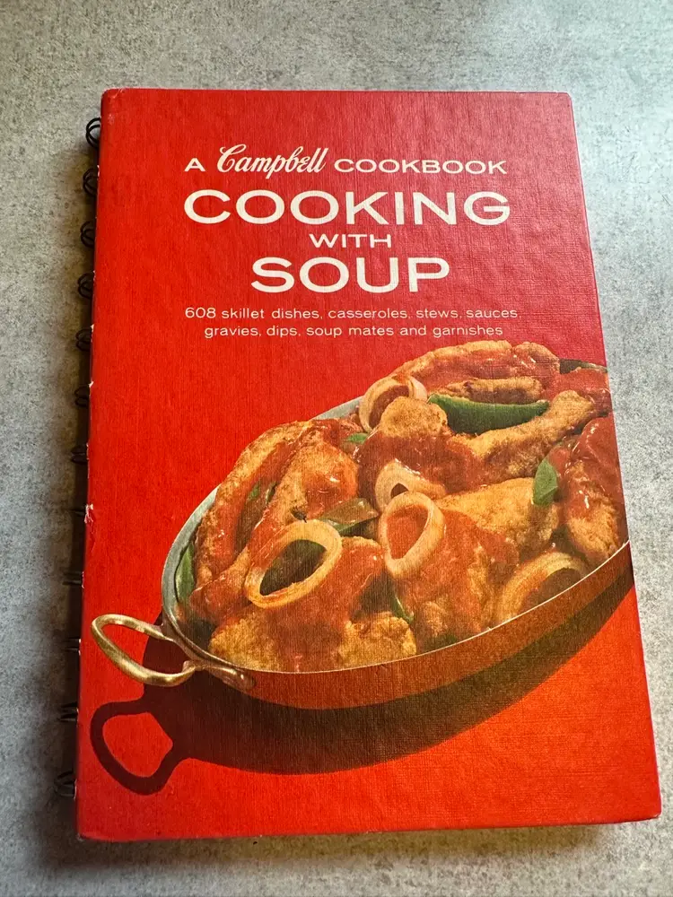 Vintage cookbook titled 'Cooking with Soup' by Campbell Soup
Company.
