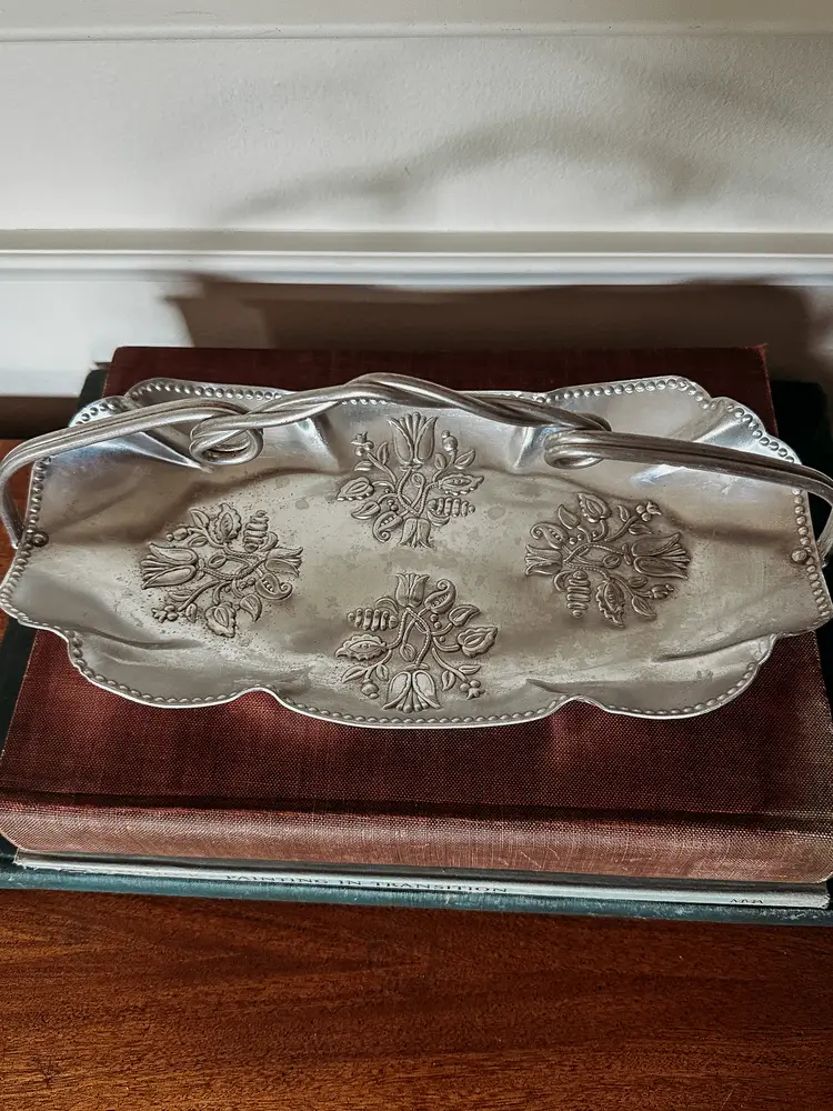 vintage hammered aluminum serving tray with a twisted handle