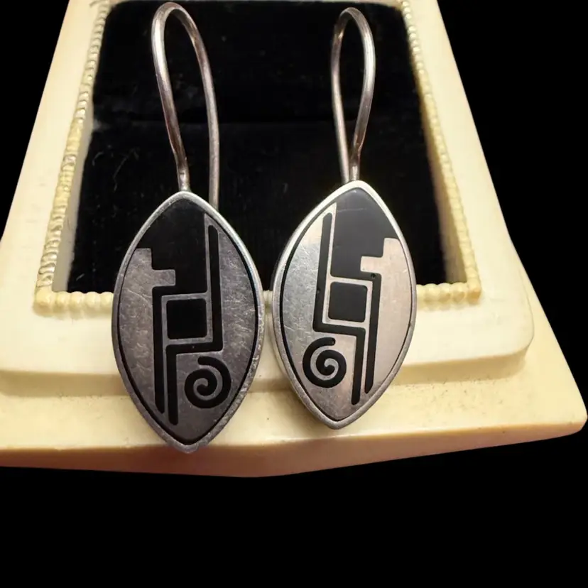 vintage sterling silver Hopi overlay dangle earrings featuring traditional water and cloud designs
