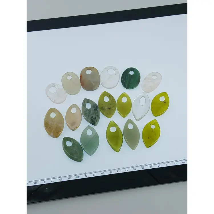 Seventeen Mixed Gemstone Pendants with Bails